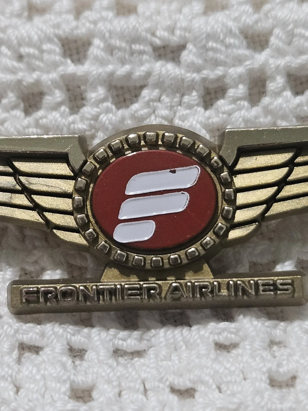 vintage 1970s Frontier Airlines Junior Pilot lapel pin.
